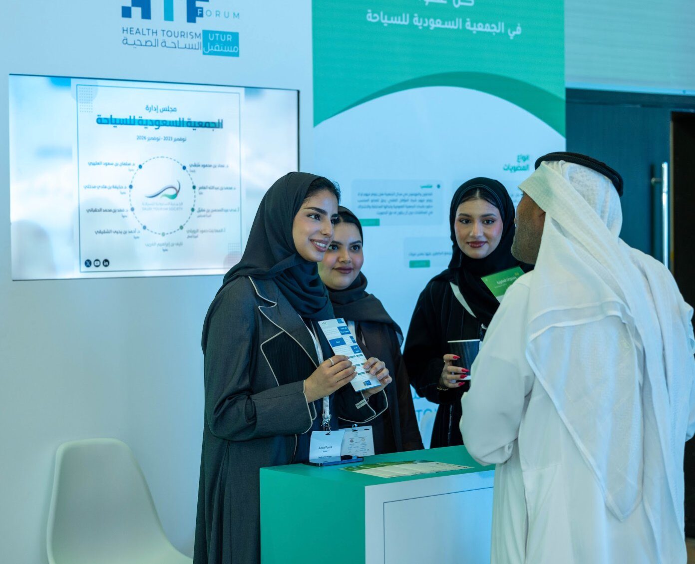 Delegate welcome at the forum stand